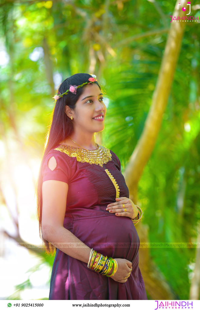 Indian Couple Posing for Maternity Baby Shoot with White Plain Background.  the Couple is Posing in a Lawn with Green Grass and the Stock Image - Image  of hand, bump: 268484751